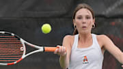 Ames’ Stella Gens returns the ball against Indianola’s Paige Dahl in the high school girls tennis at Ames Tennis Court in the school sports complex on May 2, 2025, in, Ames, Iowa.