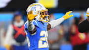 Nov 21, 2021; Inglewood, California, USA; Los Angeles Chargers cornerback Asante Samuel Jr. (26) celebrates after stopping the Pittsburgh Steelers short of the goal line in the first half of the game at SoFi Stadium. Mandatory Credit: Jayne Kamin-Oncea-Imagn Images