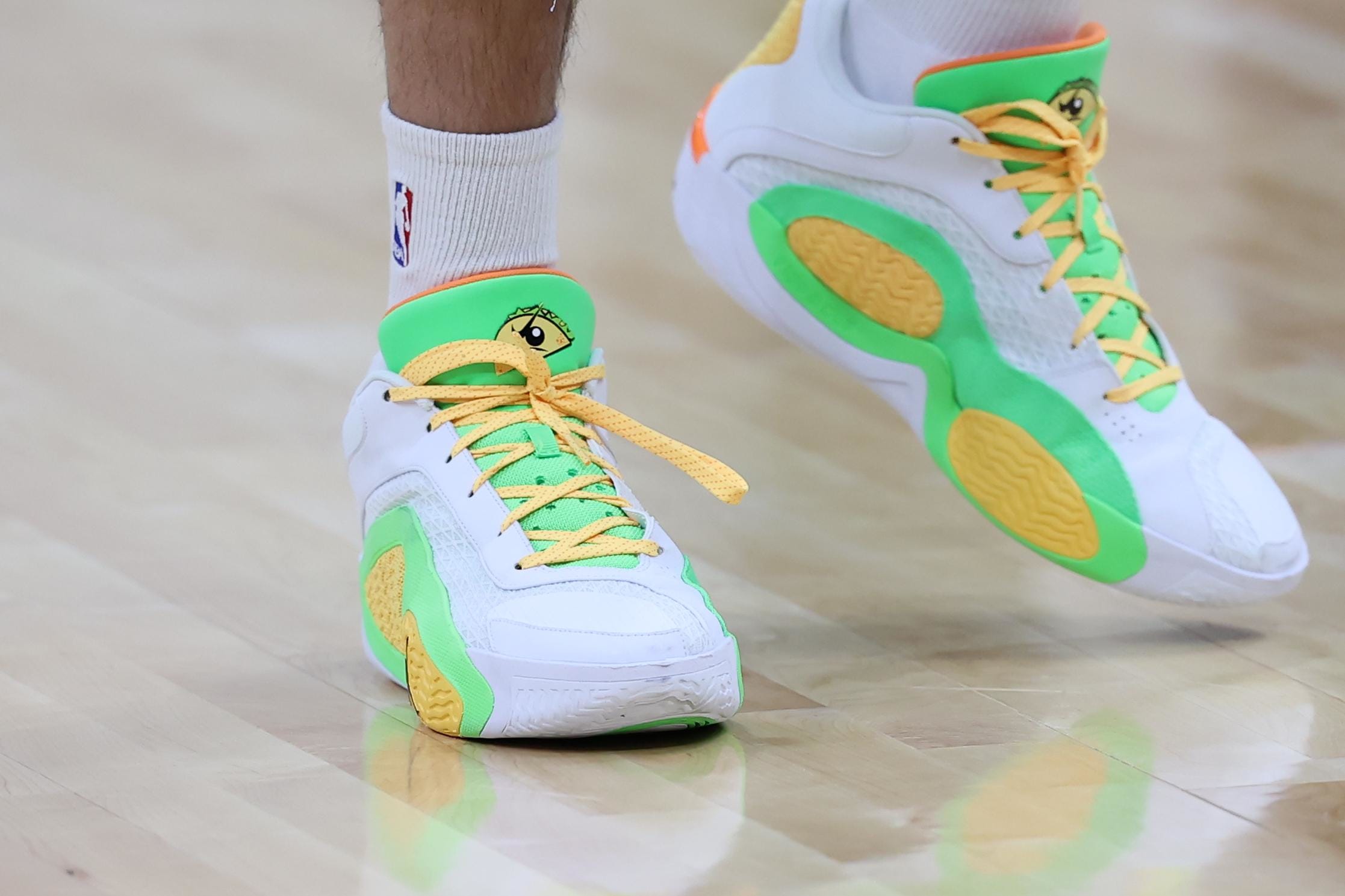 Boston Celtics forward Jayson Tatum's green sneakers.