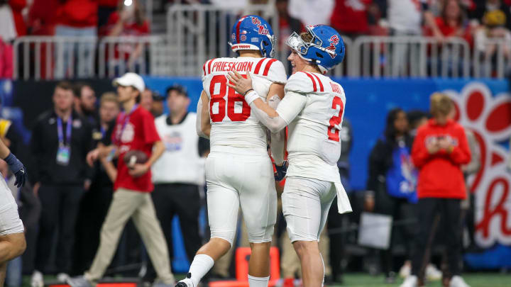 Dec 30, 2023; Atlanta, GA, USA; Mississippi Rebels tight end Caden Prieskorn (86) and quarterback Jaxson Dart (2) celebrate after a two-point conversion against the Penn State Nittany Lions in the second half at Mercedes-Benz Stadium. Mandatory Credit: Brett Davis-USA TODAY Sports