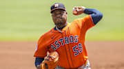 Sep 14, 2025; Cumberland, Georgia, USA; Houston Astros starting pitcher Framber Valdez (59) pitches against the Atlanta Braves during the first inning at Truist Park. 