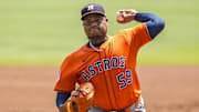 Sep 14, 2025; Cumberland, Georgia, USA; Houston Astros starting pitcher Framber Valdez (59) pitches against the Atlanta Braves during the first inning at Truist Park. Mandatory Credit: Dale Zanine-Imagn Images