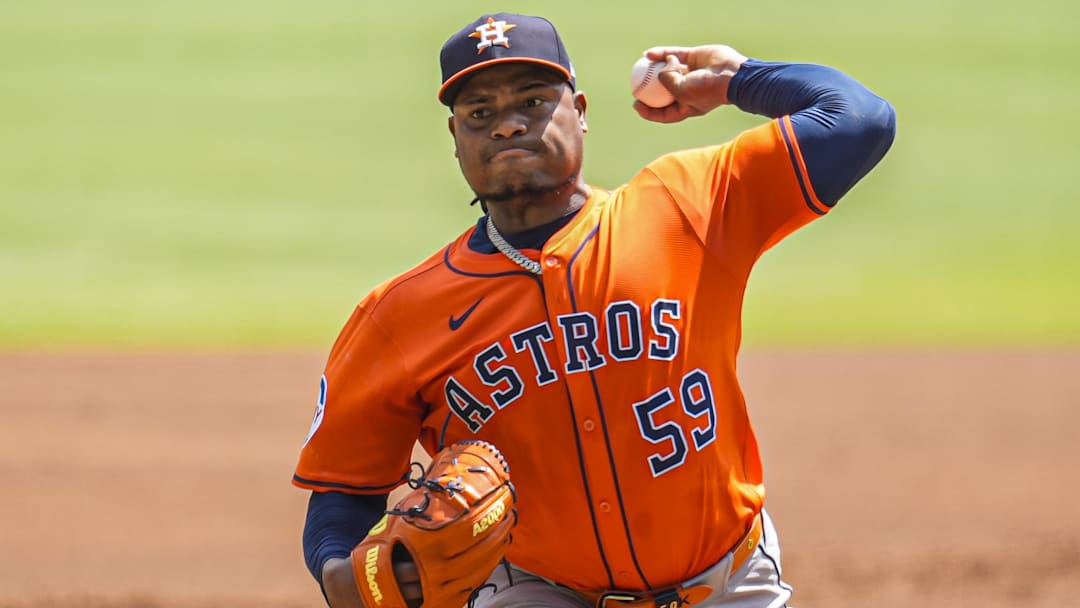 Sep 14, 2025; Cumberland, Georgia, USA; Houston Astros starting pitcher Framber Valdez (59) pitches against the Atlanta Braves during the first inning at Truist Park. Mandatory Credit: Dale Zanine-Imagn Images
