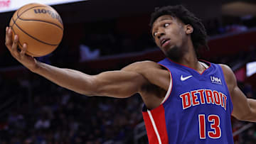 Former Detroit Pistons center James Wiseman (13) grabs the rebound in the second half against the Chicago Bulls at Little Caesars Arena.