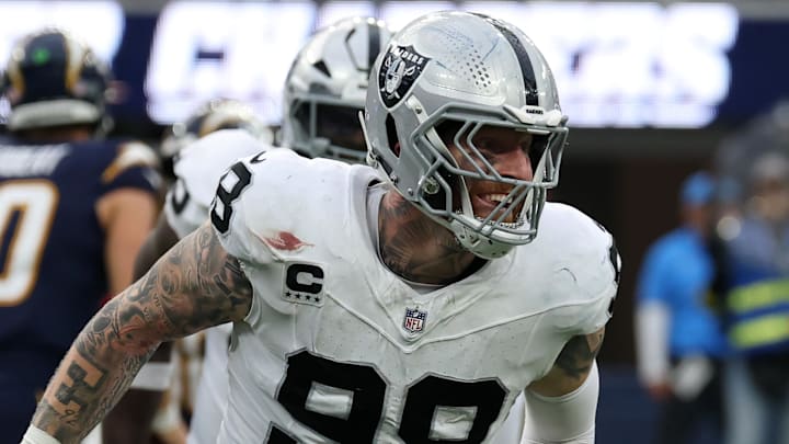 Nov 30, 2025; Inglewood, California, USA; Las Vegas Raiders defensive end Maxx Crosby (98) reacts after a tackle against the Los Angeles Chargers during the second half at SoFi Stadium. 