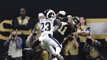 Los Angeles Rams defensive back Nickell Robey-Coleman breaks up a pass intended for New Orleans Saints wide receiver Tommylee Lewis