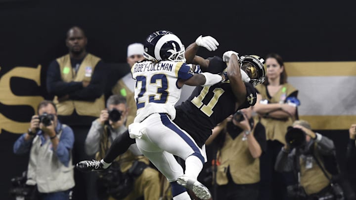 Los Angeles Rams defensive back Nickell Robey-Coleman breaks up a pass intended for New Orleans Saints wide receiver Tommylee Lewis