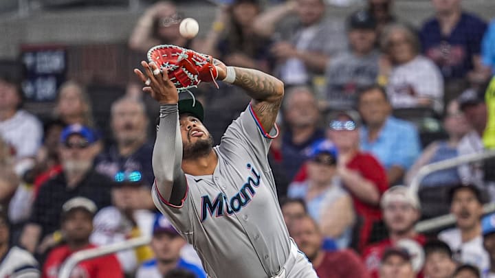 Apr 15, 2026; Cumberland, Georgia, USA; Miami Marlins first baseman Deyvison de Los Santos (63) catches a pop up against the Atlanta Braves during the third inning at Truist Park. All players are wearing number 42 today in honor of Jackie Robinson. Mandatory Credit: Dale Zanine-Imagn Images