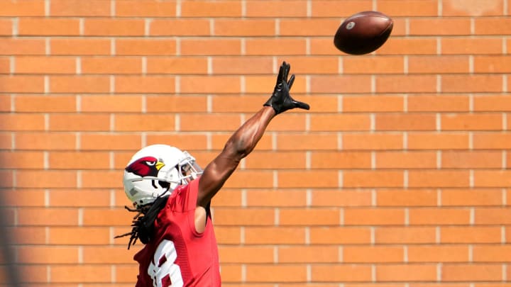 Arizona Cardinals wide receiver Marvin Harrison Jr. (18) makes a one-handed catch during minicamp at Dignity Health Training Center on June 11, 2024.