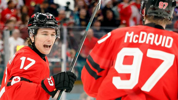 Feb 18, 2026; Milan, Italy; Macklin Celebrini of Canada celebrates with Connor McDavid after scoring their first goal against Czechia in a men's ice hockey quarterfinal during the Milano Cortina 2026 Olympic Winter Games at Milano Santagiulia Ice Hockey Arena. Mandatory Credit: Geoff Burke-Imagn Images