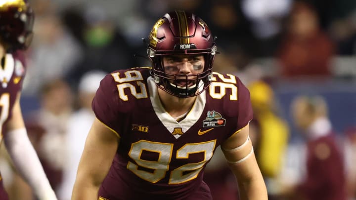 Dec 28, 2021; Phoenix, AZ, USA; Minnesota Golden Gophers defensive lineman Danny Striggow (92) against the West Virginia Mountaineers in the Guaranteed Rate Bowl at Chase Field. Mandatory Credit: Mark J. Rebilas-USA TODAY Sports