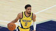 Jun 19, 2025; Indianapolis, Indiana, USA; Indiana Pacers guard Tyrese Haliburton (0) dribbles the ball against the Oklahoma City Thunder in the second quarter during game six of the 2025 NBA Finals at Gainbridge Fieldhouse. Mandatory Credit: Trevor Ruszkowski-Imagn Images