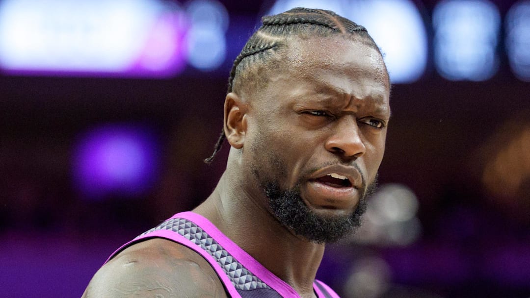 Feb 20, 2026; Minneapolis, Minnesota, USA; Minnesota Timberwolves forward Julius Randle (30) talks with referee Josh Tiven (58) in the fourth quarter against the Dallas Mavericks at Target Center. Mandatory Credit: Matt Blewett-Imagn Images