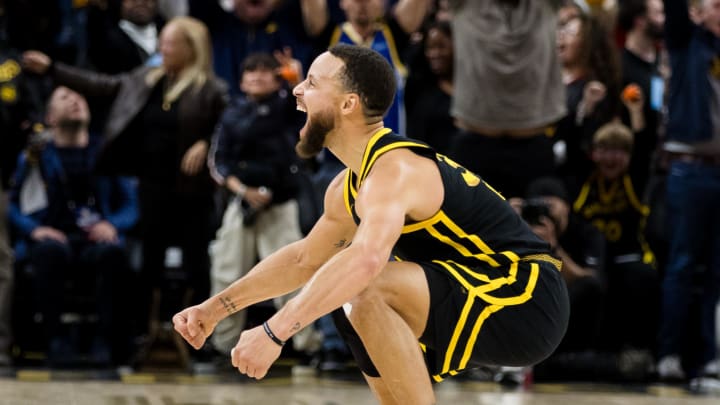 Feb 10, 2024; San Francisco, California, USA; Golden State Warriors guard Stephen Curry (30) reacts after hitting a three-ppont shot in the last second against the Phoenix Suns during the second half at Chase Center. Mandatory Credit: John Hefti-USA TODAY Sports