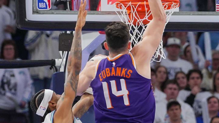 Apr 23, 2024; Minneapolis, Minnesota, USA; Phoenix Suns forward Drew Eubanks (14) dunks against the Minnesota Timberwolves in the fourth quarter during game two of the first round for the 2024 NBA playoffs at Target Center. Mandatory Credit: Brad Rempel-USA TODAY Sports
