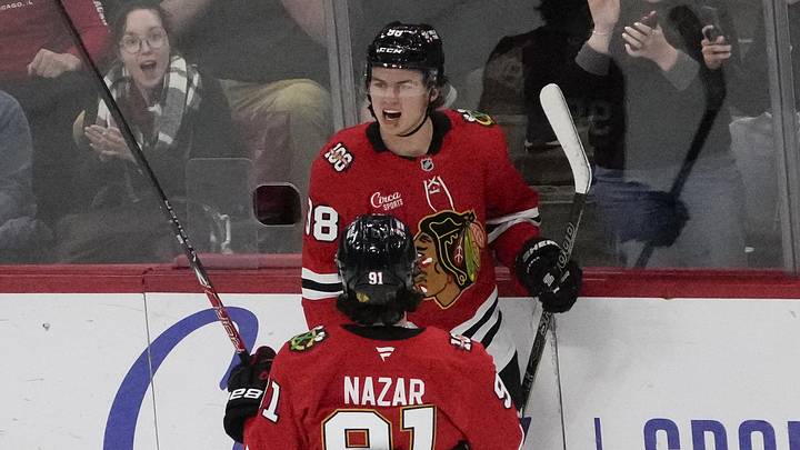 Oct 28, 2025; Chicago, Illinois, USA; Chicago Blackhawks center Connor Bedard (98) celebrates his goal against the Ottawa Senators with center Frank Nazar (91) during the first period at United Center. Mandatory Credit: David Banks-Imagn Images