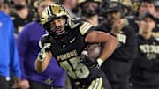 Purdue Boilermakers running back Devin Mockobee (45) runs the ball
