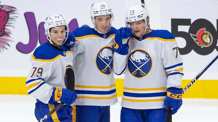 Sep 26, 2024; Ottawa, Ontario, CAN; Buffalo Sabres center Noah Ostlund (36) celebrates with team his goal scored in overtime against the Ottawa Senators at the Canadian Tire Centre. Mandatory Credit: Marc DesRosiers-Imagn Images