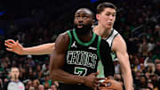 Nov 21, 2025; Boston, Massachusetts, USA; Brooklyn Nets guard Egor Demin (8) tries to poke the ball from Boston Celtics guard Jaylen Brown (7) during the second half at TD Garden. Mandatory Credit: Bob DeChiara-Imagn Images