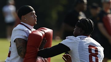 Washington Commanders running back Brian Robinson Jr. and cornerback Car'lin Vigers