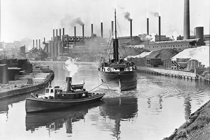Two ships and factories in and around the Cuyahoga River in Cleveland in 1936