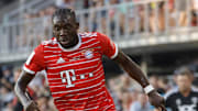 Jul 20, 2022; Washington, DC, USA; Bayern Munich defender Alphonso Davies (19) dribbles the ball against D.C. United at Audi Field. Mandatory Credit: Geoff Burke-Imagn Images