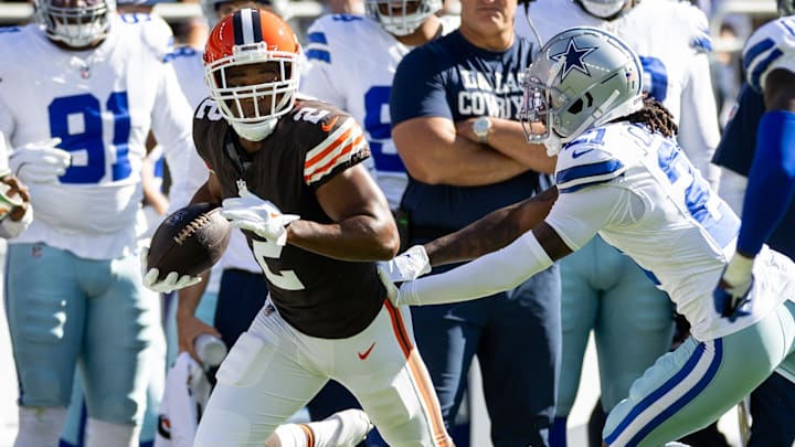 Sep 8, 2024; Cleveland, Ohio, USA; Cleveland Browns wide receiver Amari Cooper (2) runs the ball as Dallas Cowboys cornerback Caelen Carson (21) pushes him out of bounds during the first quarter at Huntington Bank Field. Mandatory Credit: Scott Galvin-Imagn Images