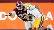 Alabama defensive lineman LT Overton sacks LSU quarterback Michael Van Buren Jr. 