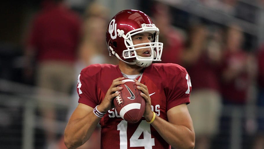 Oklahoma Sooners quarterback Sam Bradford sets to throw a pass against the BYU Cougars.