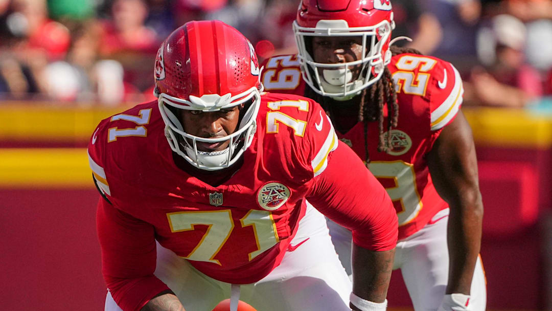 Sep 28, 2025; Kansas City, Missouri, USA; Kansas City Chiefs offensive tackle Josh Simmons (71) and running back Kareem Hunt (29) line up against the Baltimore Ravens during the game at GEHA Field at Arrowhead Stadium. Mandatory Credit: Denny Medley-Imagn Images