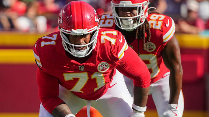 Sep 28, 2025; Kansas City, Missouri, USA; Kansas City Chiefs offensive tackle Josh Simmons (71) and running back Kareem Hunt (29) line up against the Baltimore Ravens during the game at GEHA Field at Arrowhead Stadium. Mandatory Credit: Denny Medley-Imagn Images