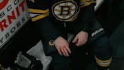 Trent Frederic’s bloody knuckles after a tilt with Corey Perry.