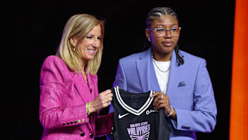 Apr 14, 2025; New York, New York, USA; Shyanne Sellers poses with WNBA commissioner Cathy Engelbert after being selected with the number seventeen overall pick to the Golden State Valkyries in the 2025 WNBA Draft at The Shed at Hudson Yards. Mandatory Credit: Vincent Carchietta-Imagn Images 