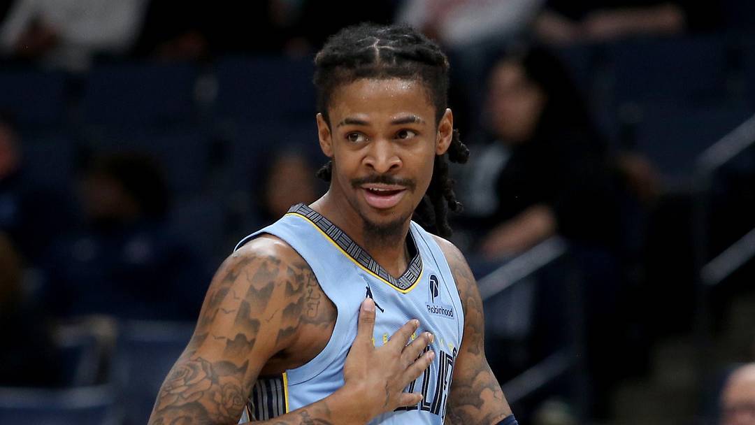 Jan 21, 2026; Memphis, Tennessee, USA; Memphis Grizzlies guard Ja Morant (12) reacts during the first quarter against the Atlanta Hawks at FedExForum. Mandatory Credit: Petre Thomas-Imagn Images