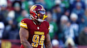 Dec 22, 2024; Landover, Maryland, USA; Washington Commanders defensive tackle Daron Payne (94) celebrates after a play during the third quarter against the Philadelphia Eagles at Northwest Stadium. Mandatory Credit: Peter Casey-Imagn Images