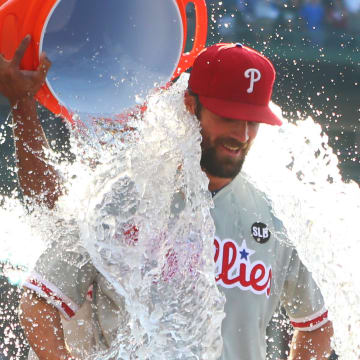 Philadelphia Phillies starting pitcher Cole Hamels (35) is doused with water after throwing a no hitter against the Chicago Cubs at Wrigley Field in 2015.