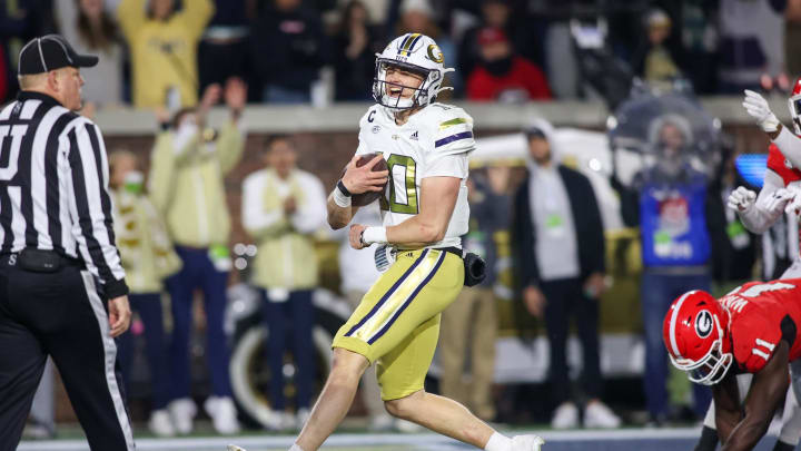 Nov 25, 2023; Atlanta, Georgia, USA; Georgia Tech Yellow Jackets quarterback Haynes King (10) runs for a touchdown against the Georgia Bulldogs in the second half at Bobby Dodd Stadium at Hyundai Field. Mandatory Credit: Brett Davis-USA TODAY Sports