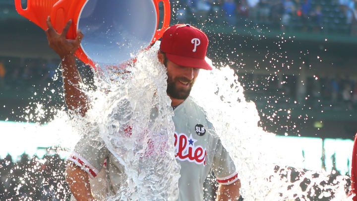  Philadelphia Phillies starting pitcher Cole Hamels (35) is doused with water after throwing a no hitter against the Chicago Cubs at Wrigley Field in 2015.