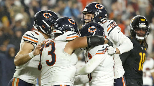 Bears kicker Jake Moody celebrates with teammates after kicking a game-winning field goal against the Commanders.