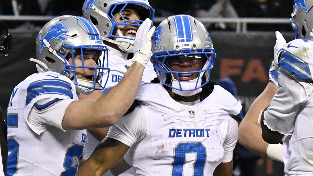 Detroit Lions running back Jahmyr Gibbs (0) celebrates with teammates after scoring a touchdown against Bears