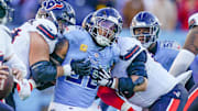 Tennessee Titans defensive tackle Jeffery Simmons (98) applies pressure to Houston Texans quarterback Davis Mills (10) during the fourth quarter at Nissan Stadium in Nashville, Tenn., Sunday, Nov. 16, 2025.