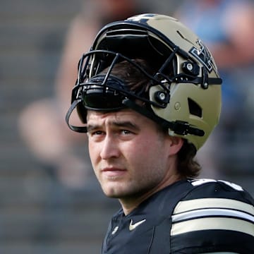 Purdue Boilermakers punter Keelan Crimmins (30) looks down field Saturday, Aug. 31, 2024, ahead of the NCAA football game at Ross-Ade Stadium in West Lafayette, Ind.