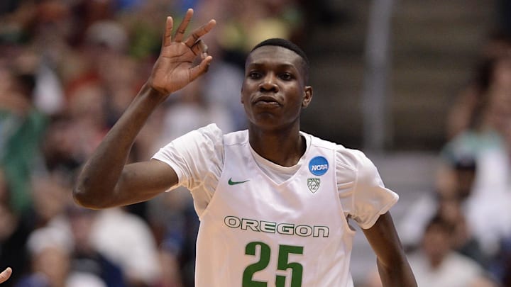 March 24, 2016; Anaheim, CA, USA; Oregon Ducks forward Chris Boucher (25) reacts to the three point basket by forward Dillon Brooks (24) against Duke Blue Devils during the first half of the semifinal game in the West regional of the NCAA Tournament at Honda Center. Mandatory Credit: Robert HanashiroImagn Images