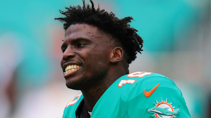 Dec 22, 2024; Miami Gardens, Florida, USA; Miami Dolphins wide receiver Tyreek Hill (10) reacts on the field before the game against the San Francisco 49ers at Hard Rock Stadium. Mandatory Credit: Sam Navarro-Imagn Images