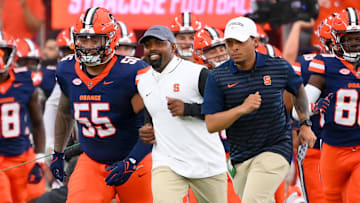 Syracuse Orange head coach Fran Brown jogs on the field prior to the game against the Ohio Bobcats.