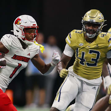 Sep 1, 2023; Atlanta, Georgia, USA; Louisville Cardinals wide receiver Jamari Thrash (1) runs after a catch against the Georgia Tech Yellow Jackets in the fourth quarter at Mercedes-Benz Stadium. Mandatory Credit: Brett Davis-Imagn Images