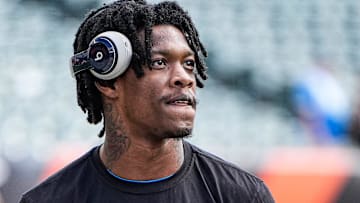 Detroit Lions wide receiver Jameson Williams (1) and wide receiver Amon-Ra St. Brown (14) warm up ahead of the Cincinnati Bengals game at Paycor Stadium in Cincinnati on Sunday, Oct. 5, 2025.