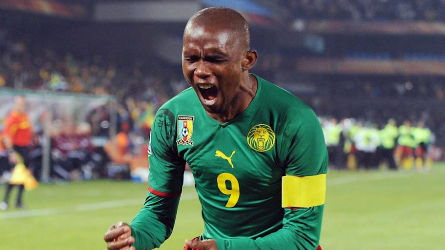 Cameroon forward Samuel Eto'o celebrates after scoring a goal during Group E play against Denmark.
