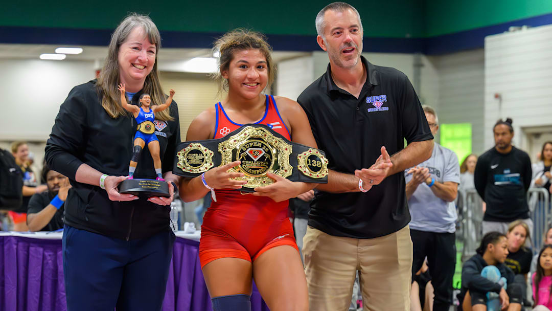 Archbishop Spalding's Taina Fernandez made history as the first four-time Super 32 champion, winning the 2025 138-pound class over the weekend in North Carolina