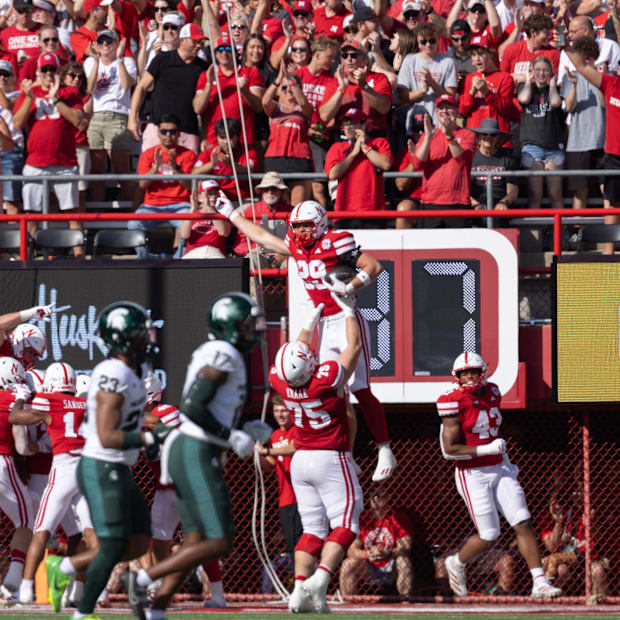 Nebraska Cornhuskers tight end Carter Nelson celebrates after scoring on a blocked punt during the first quarter of the game 